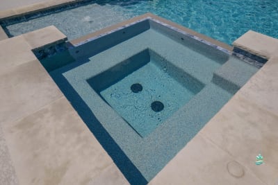 Crystal-clear pool water maintained by advanced automated filtration and cleaning equipment at the Carter Residence in Godley, Johnson County, TX.