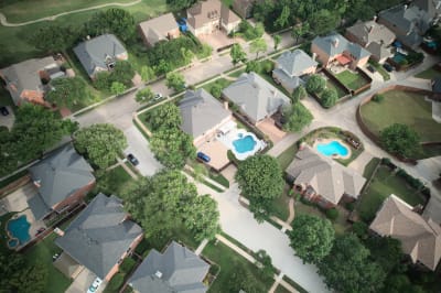 Complete outdoor living transformation featuring custom pool, integrated spa, and premium travertine finishes. Selah Pools creates resort-style environments.