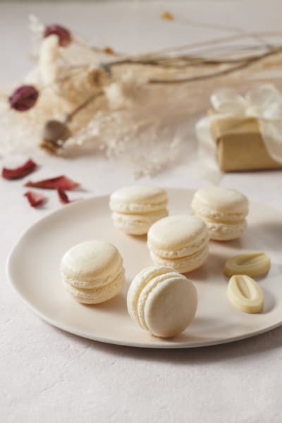 Yuzu macarons (with white shell) | Valrhona Chocolate