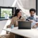 Couple researching health share plans