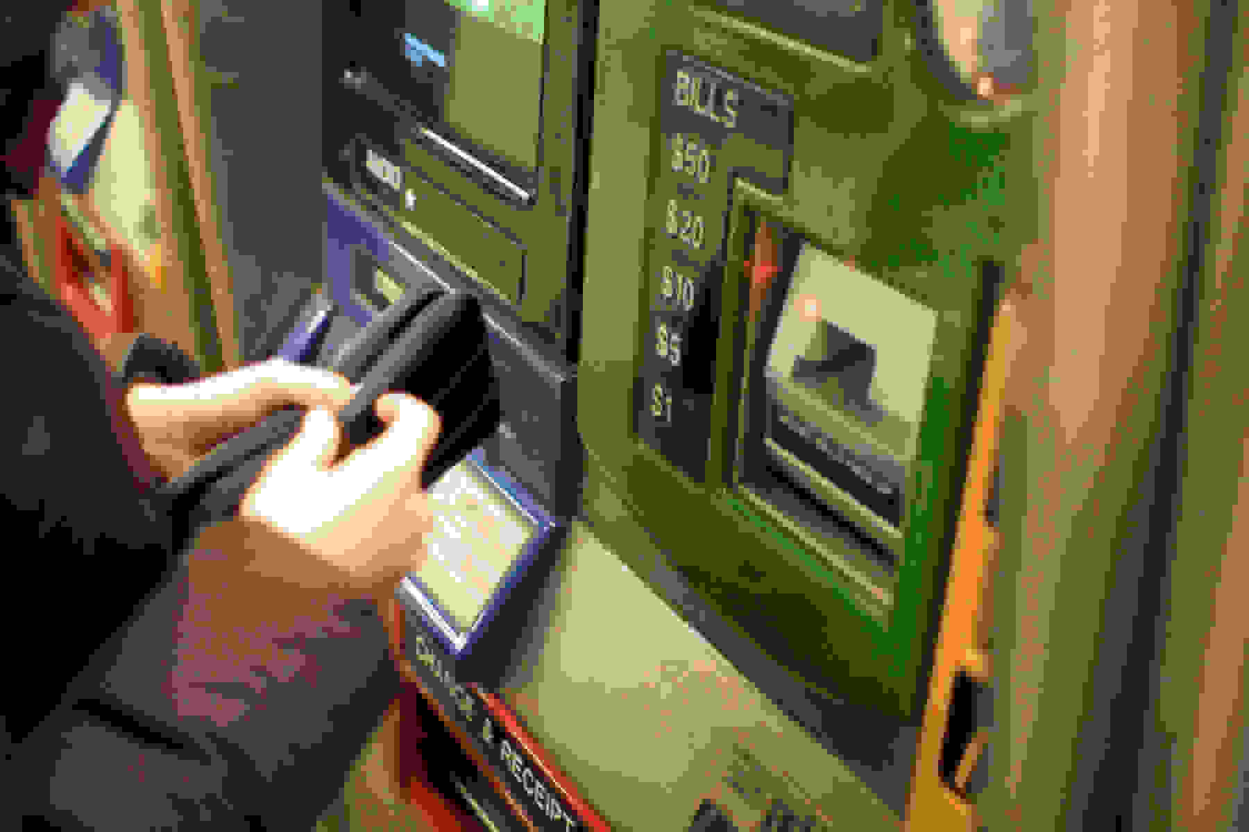 person buying metrocard to commute