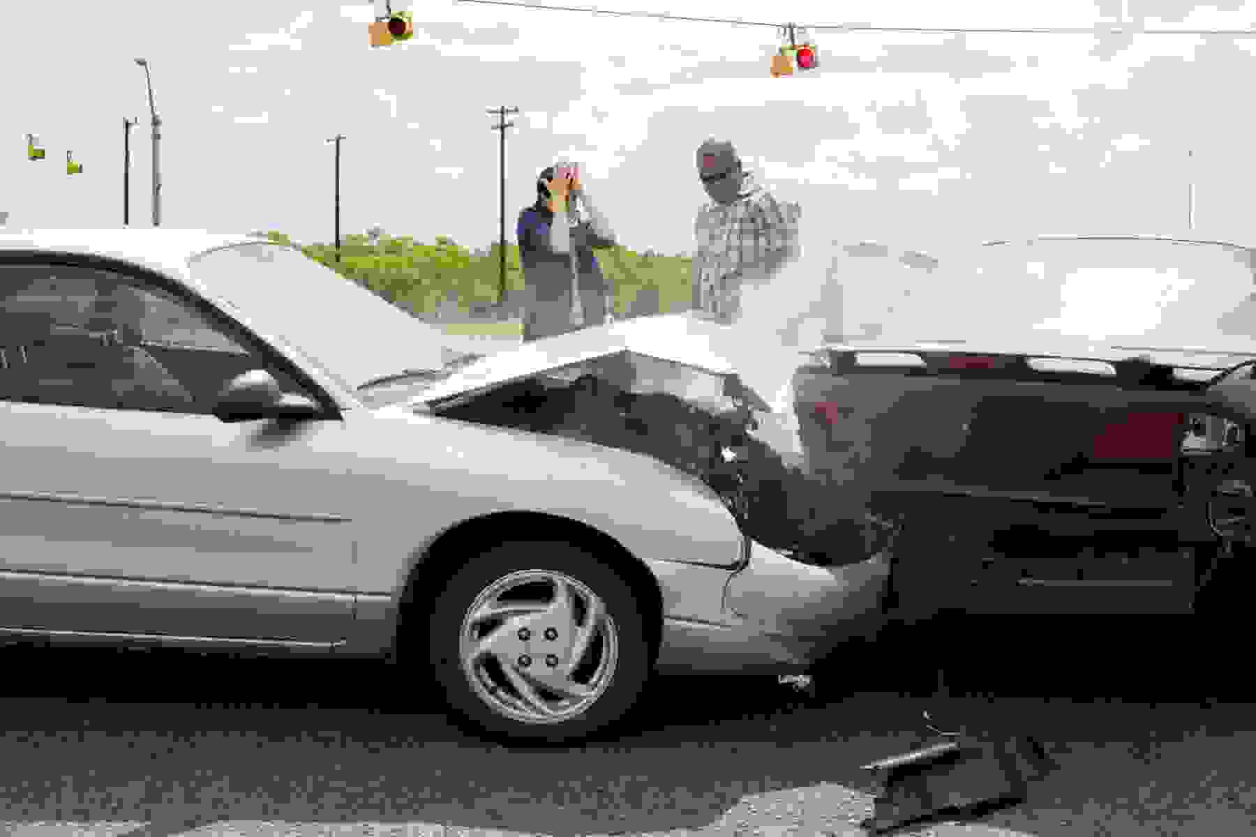 Drivers talk after a car crash.