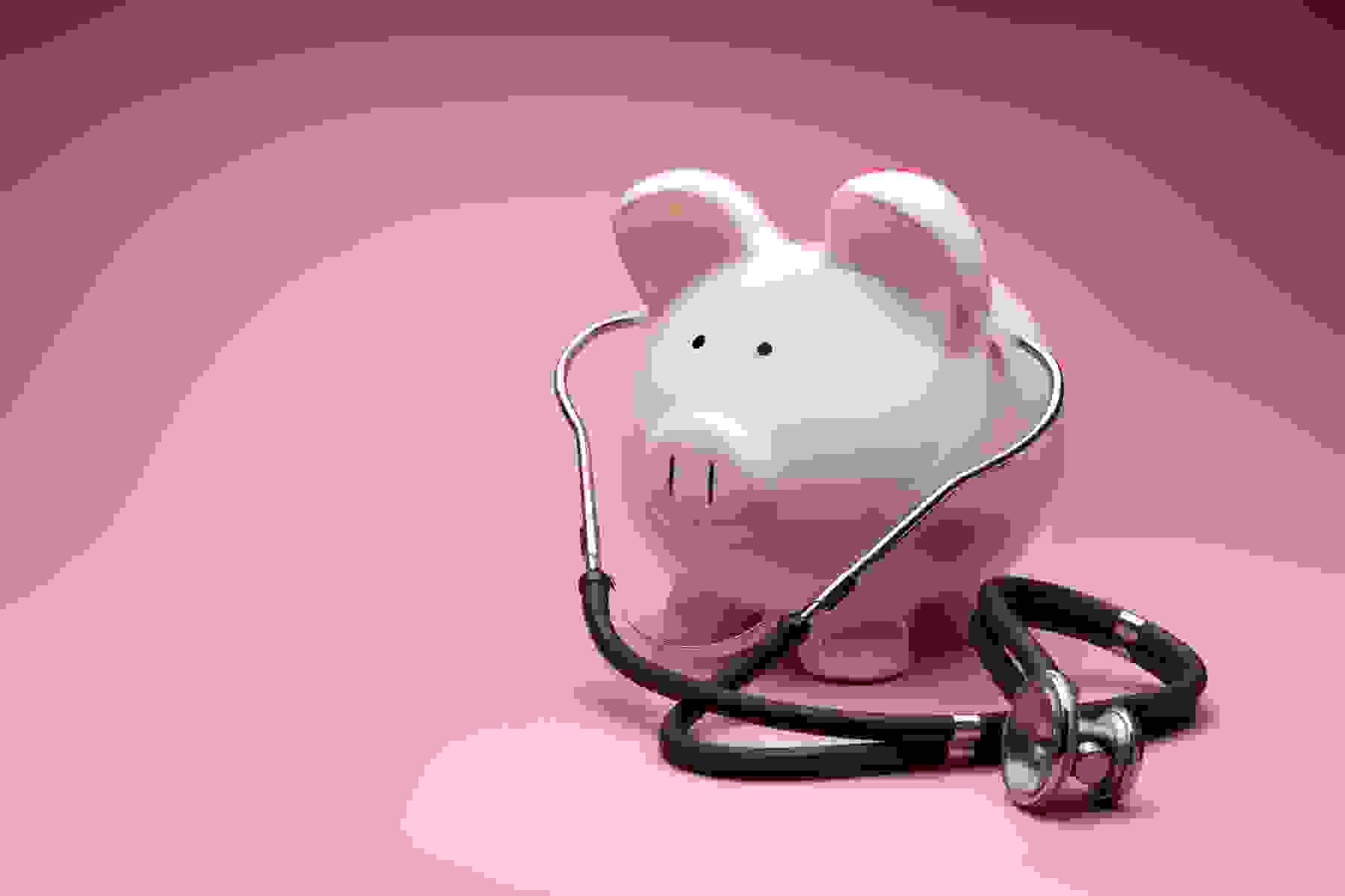 A piggybank and a stethoscope