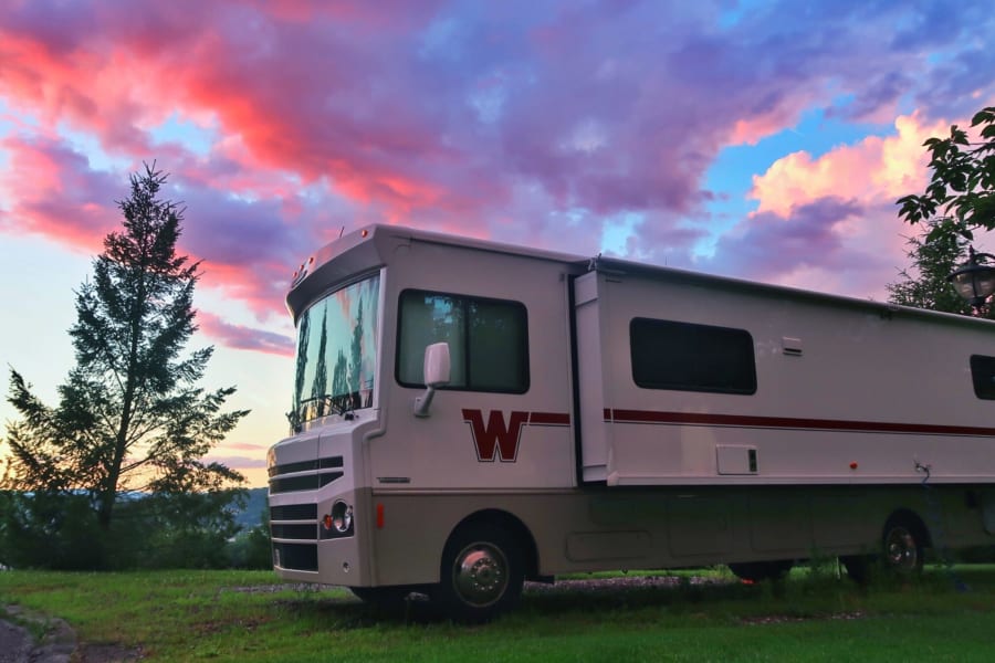 Camper trailer in the woods