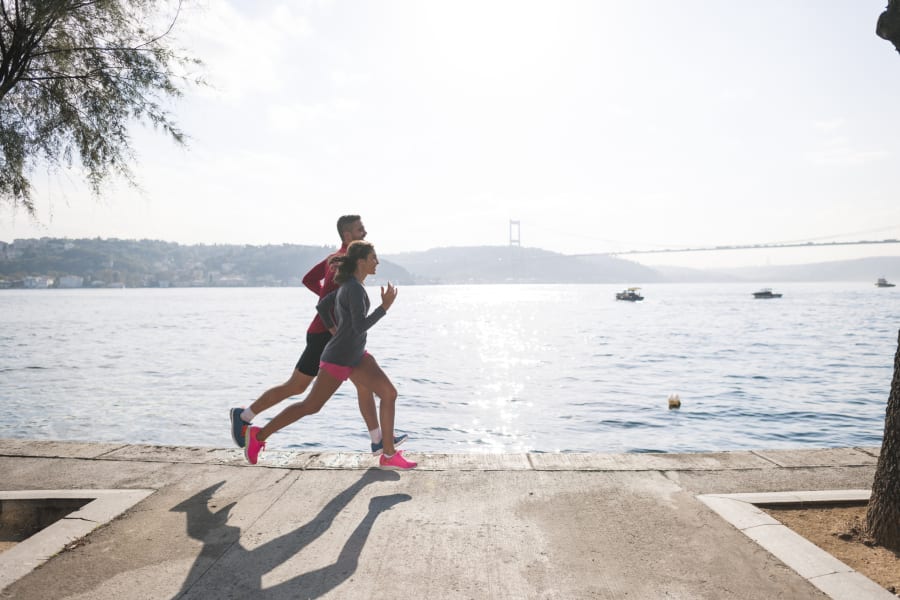 joggers near a lake