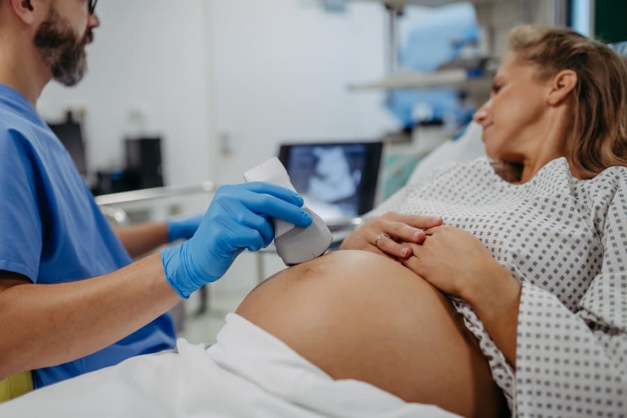 Pregnant woman seeing her doctor
