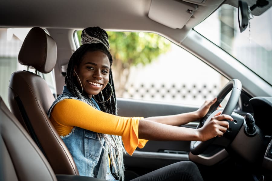 22-year-old driver sitting in driver seat