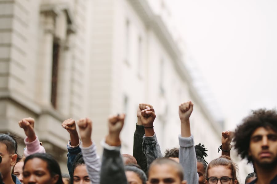 Arms raised in protest