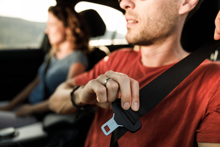 driver buckling seat belt