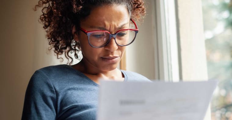 woman stressed out from high medical bill