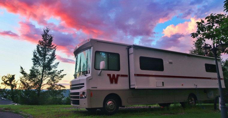 Camper trailer in the woods
