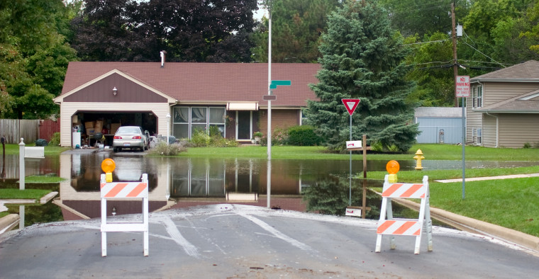 homes on flooded street