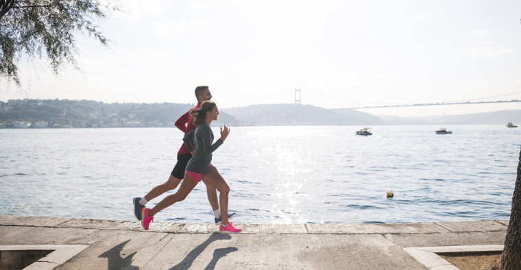 joggers near a lake