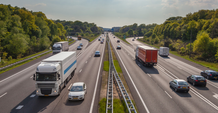 cars and trucks on highway