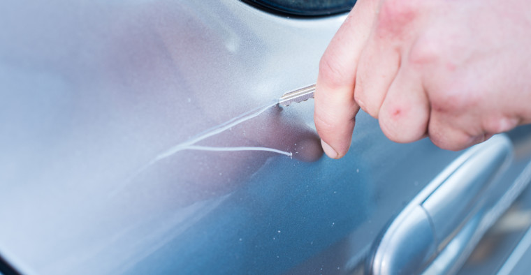 key on side of car