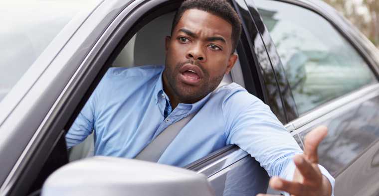 driver leaning out window