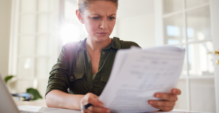 Woman busy working at home office