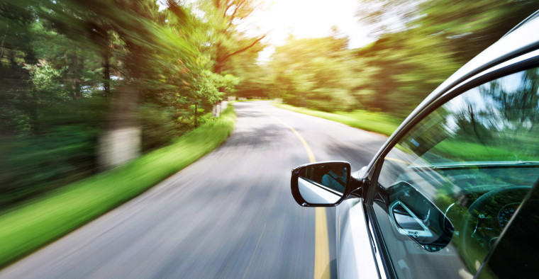 A car driving down the road