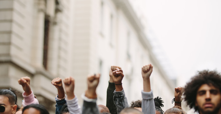Arms raised in protest