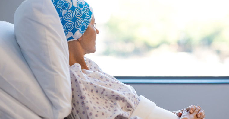 A female cancer patient resting in bed