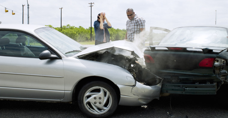Drivers talk after a car crash.