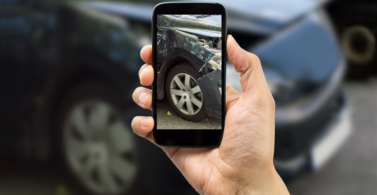 A photograph of car damage.