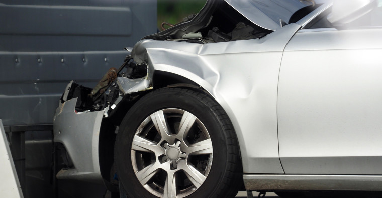 A car with a damaged front-end.