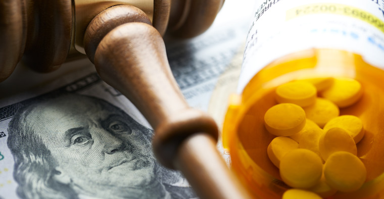 A gavel and prescription drugs