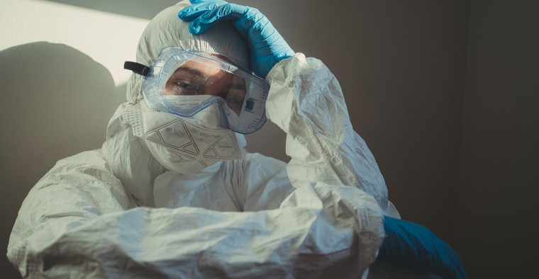 Health care worker in personal protection equipment.