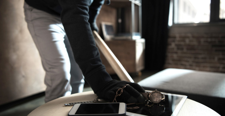 A thief takes valuables.