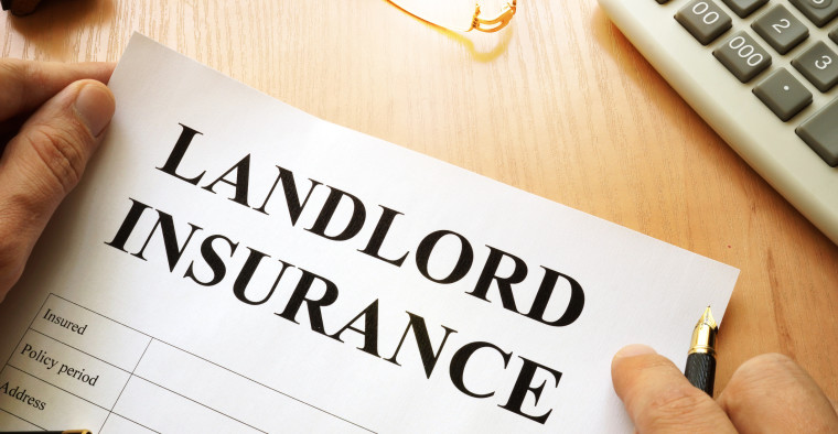 Signing a landlord insurance policy to protect rental income