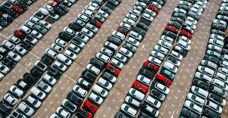 Aerial view of a large stock of cars