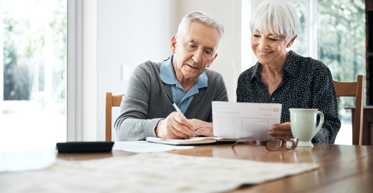Senior couple reviewing finances