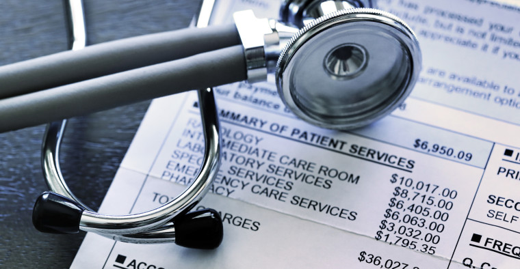 A stethoscope on a medical bill