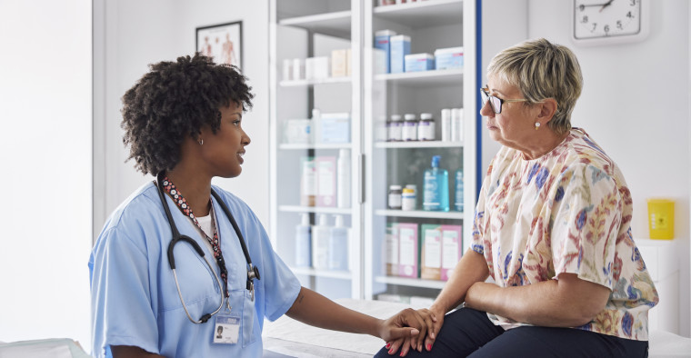 Nurse and patient talking