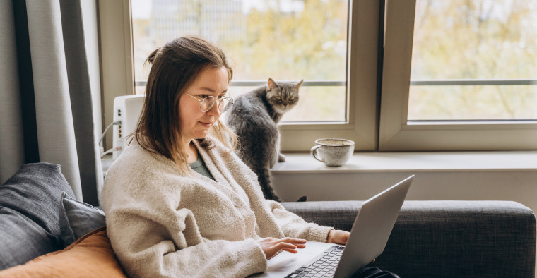 Woman researching at computer