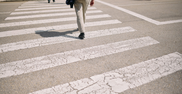 A pedestrian crosses the road.