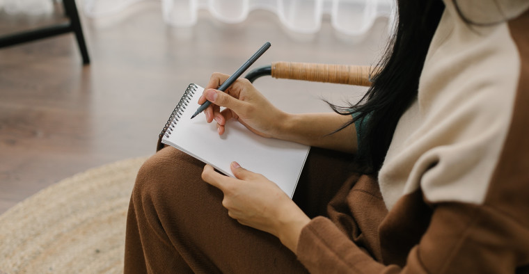 A therapist conducts a consultation.