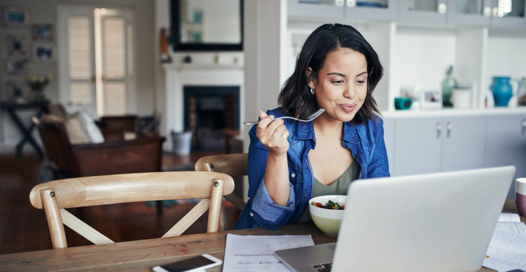 women laptop comparing health insurance