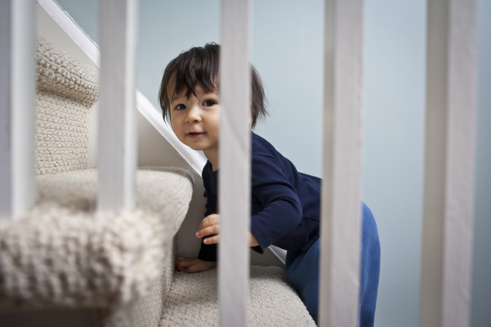 Baby climbing up stairs