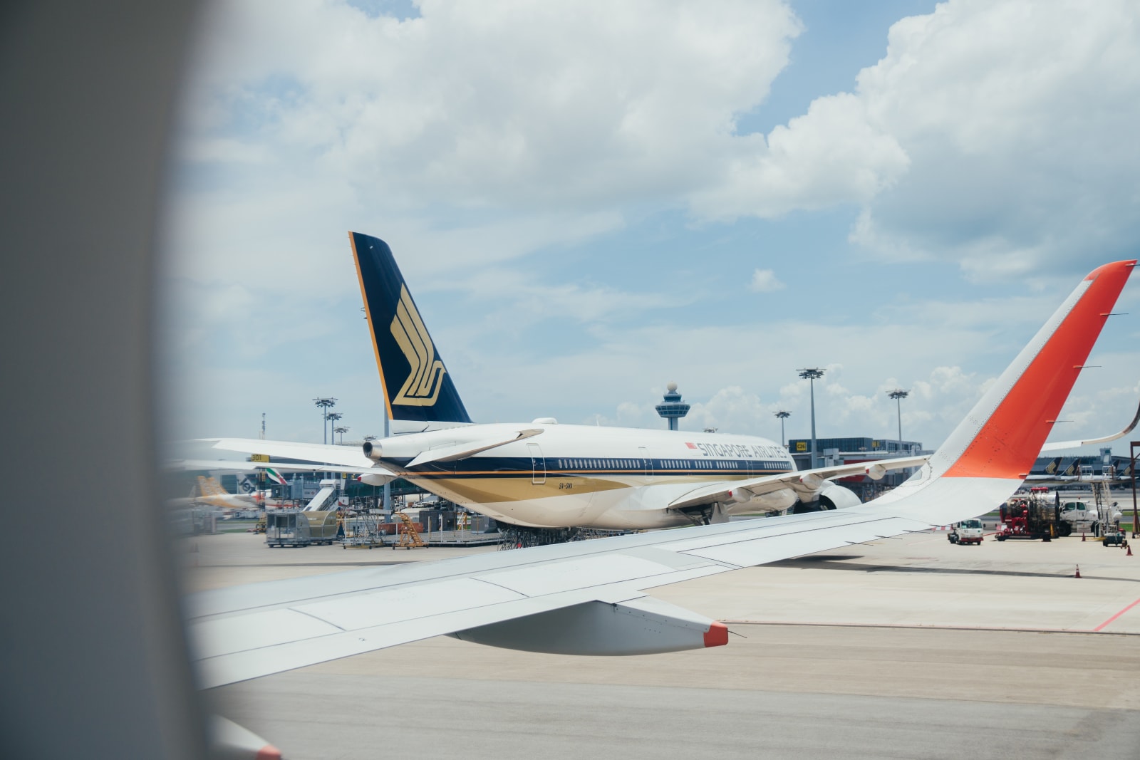 singapore airlines plane on runway