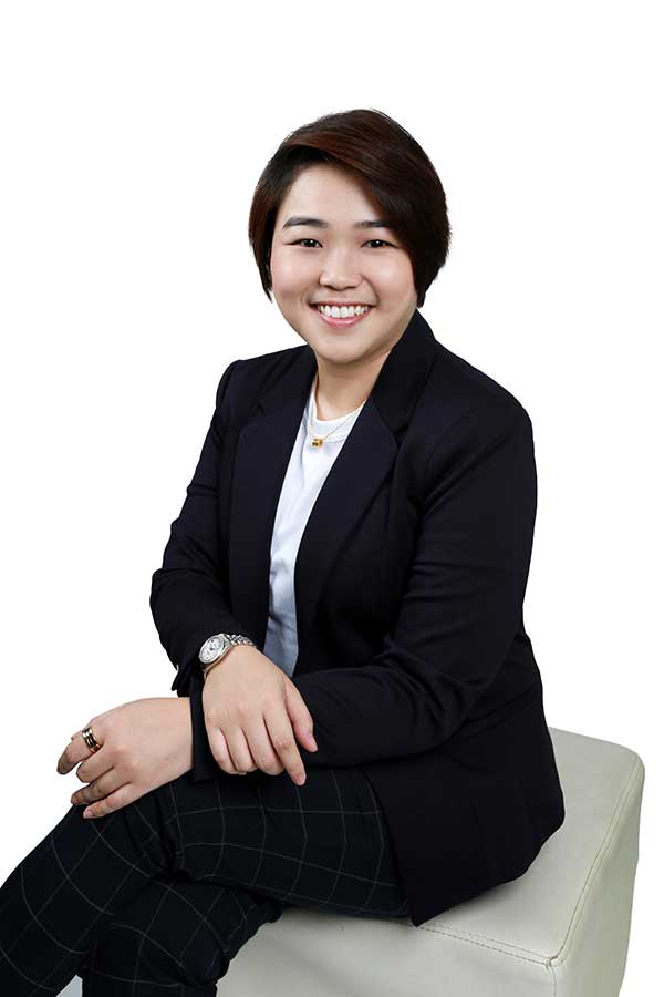 chinese woman sitting on a chair