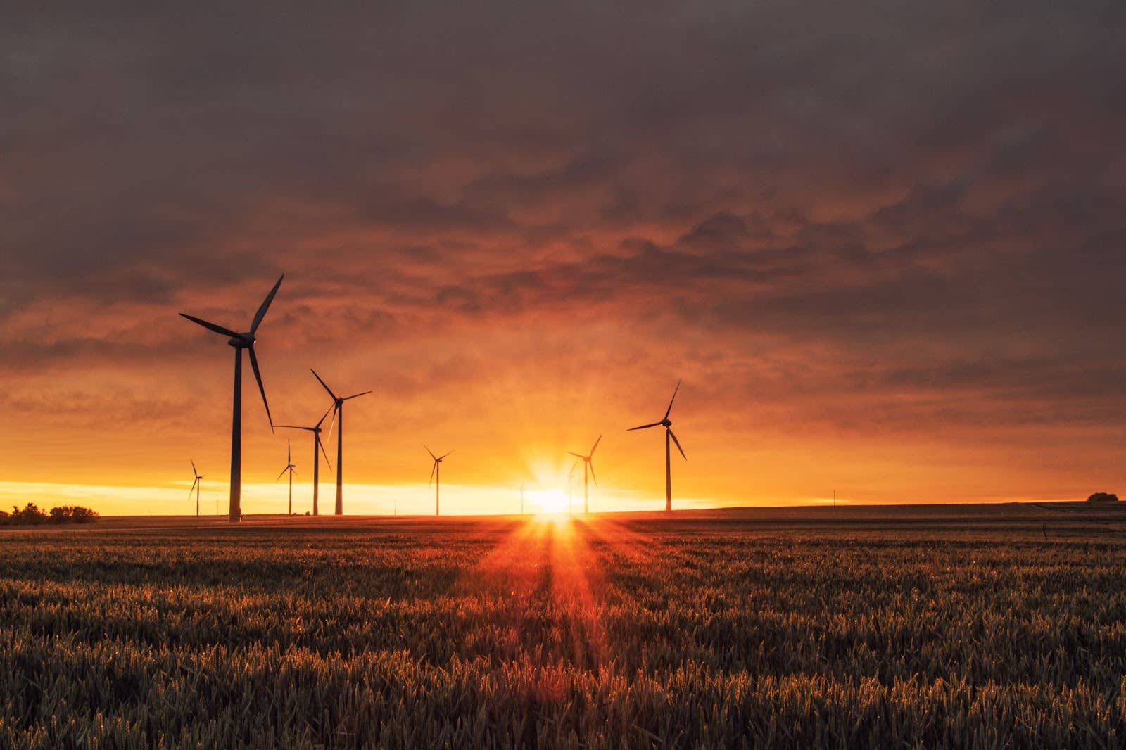 Windmill on plains with sunset