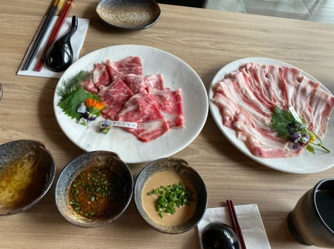 Raw shabu shabu meats.