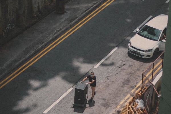Man jaywalking