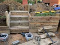 Timber Sleepers and Treated Pine Retaining Wall by JV Constructions