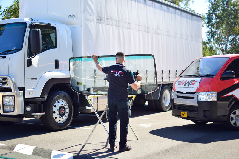 MWT Auto Glass Technician Replacing Truck Windscreen