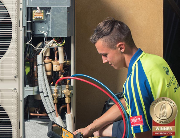 Wattle Grove Air Technician Installing Ducted Air Conditioning Unit