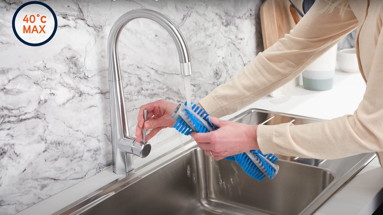 Rinse brushbar under tap