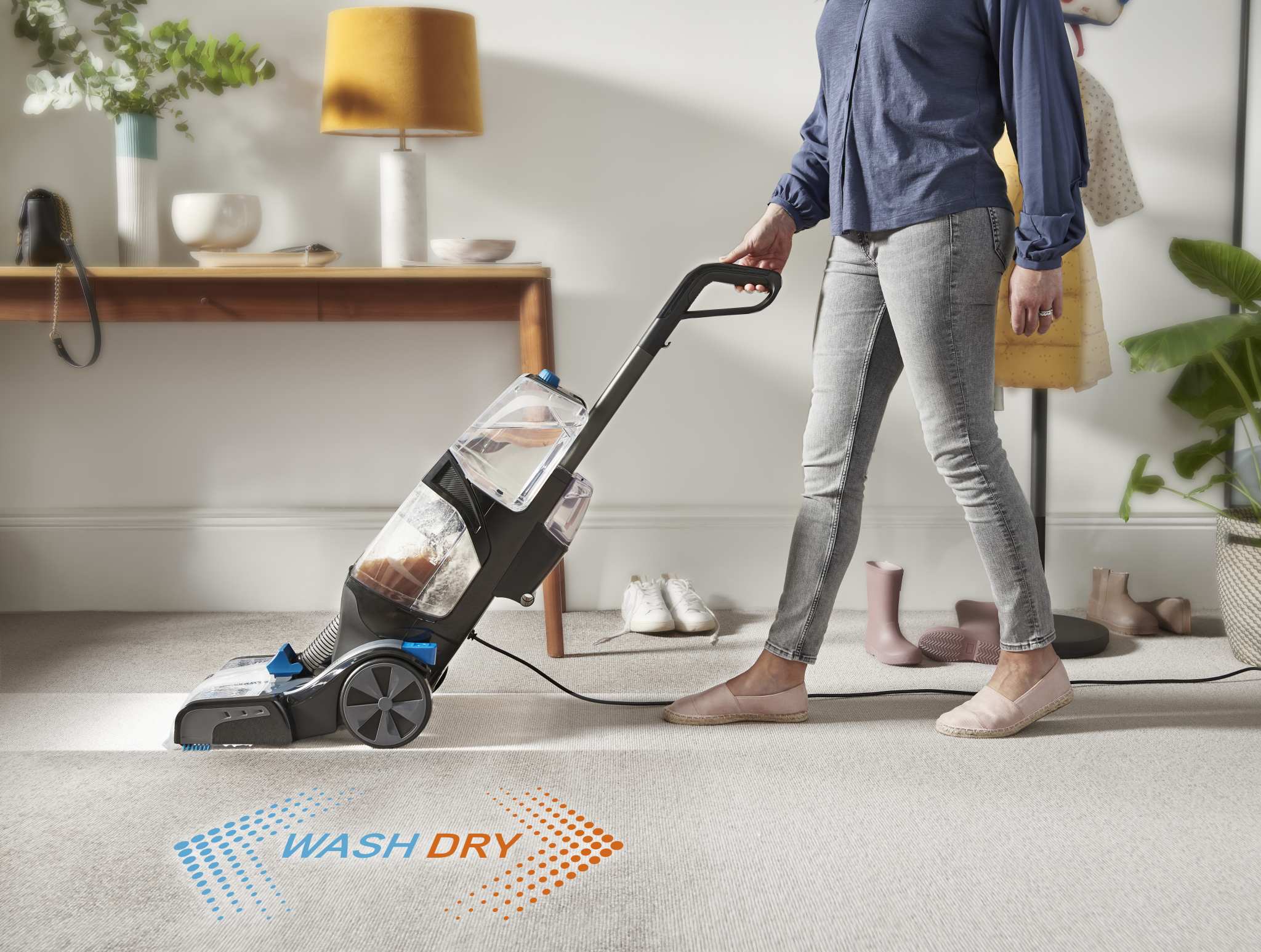 VAX Platinum SmartWash Carpet Cleaner washing carpet on forward push and drying on backward pull